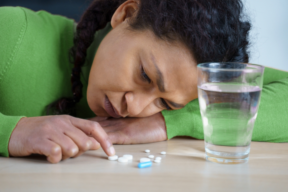 woman-taking-tablets