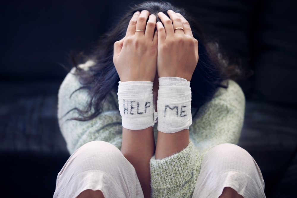 woman-asking-help-self-harm