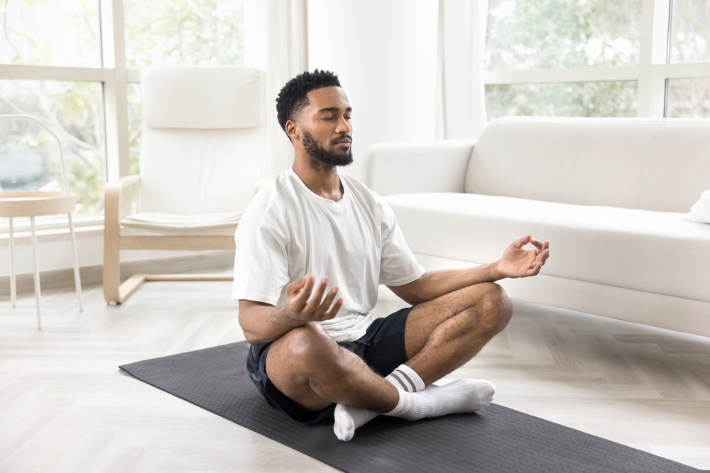 man-doing-meditation-at-home