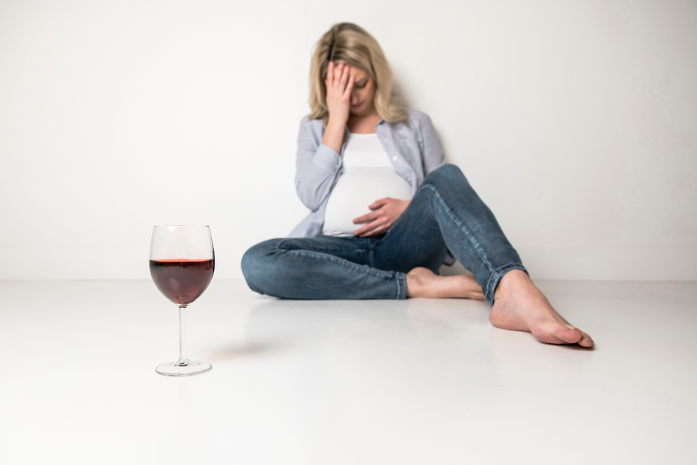 pregnent-woman-depressed-while-drinking