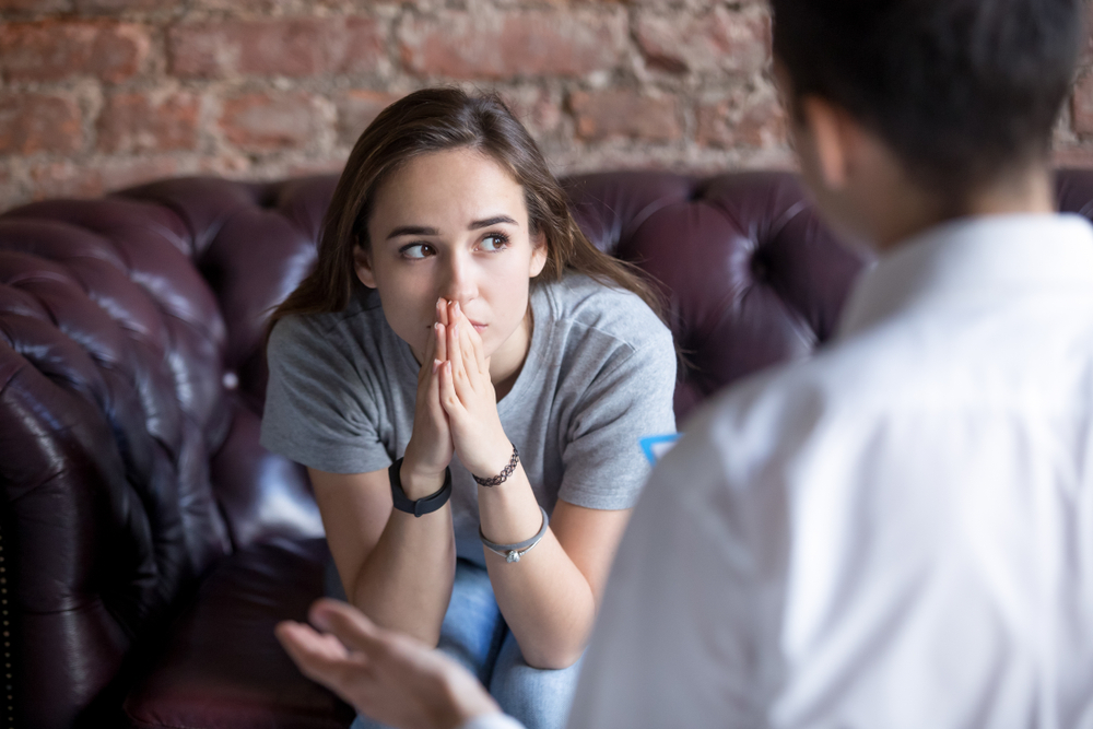 stressed-woman-in-therapy