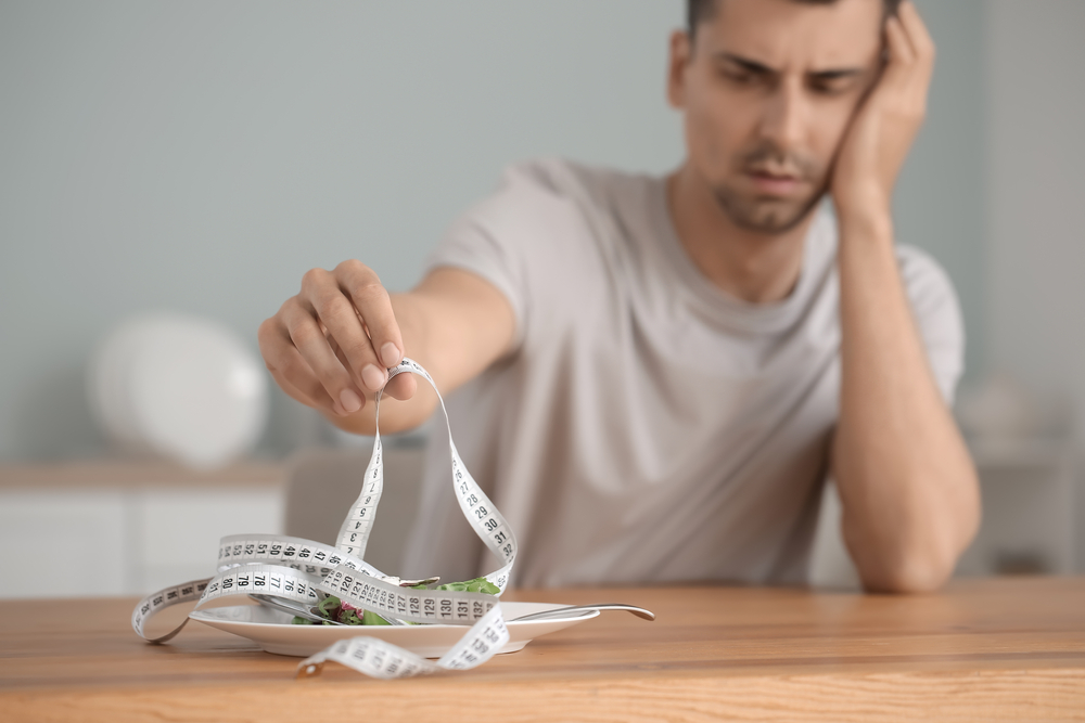 young-man-suffring-Anorexia