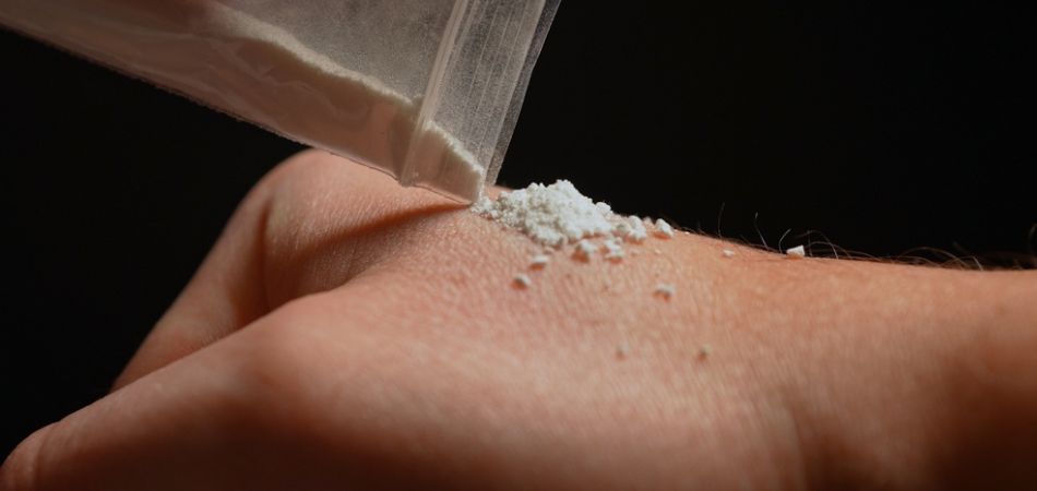 man taking ketamine dust