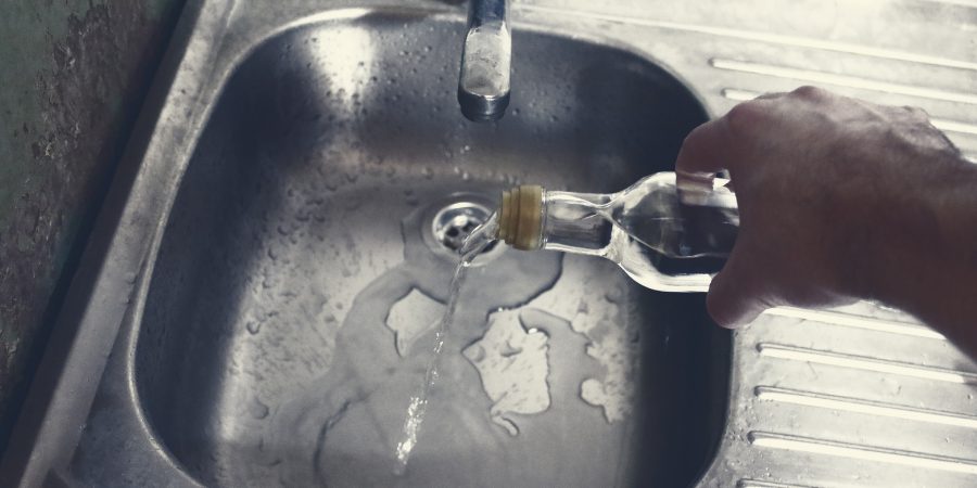 12 Step Therapy Pouring Away Alcohol