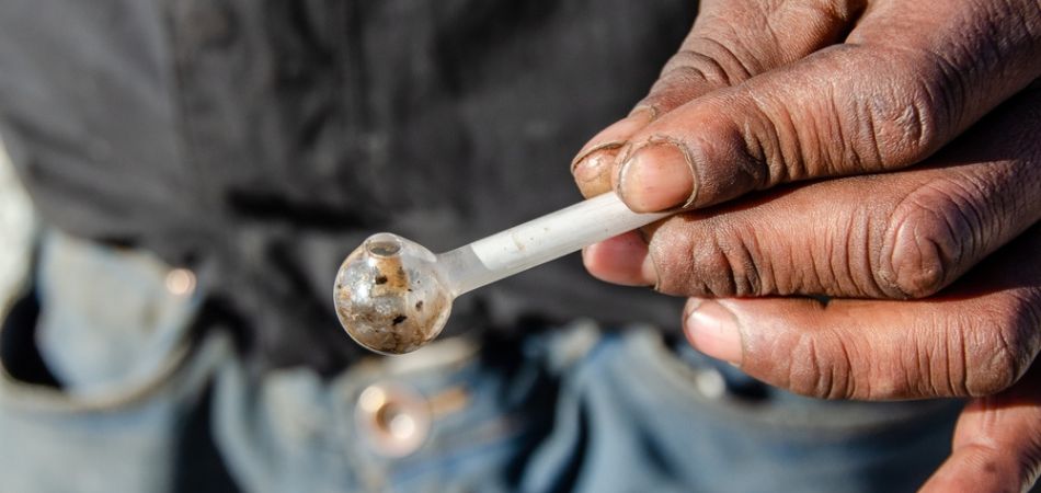 man taking crystal meth