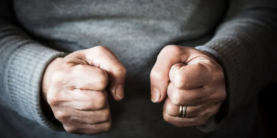 Anger management and addiction clenched fists