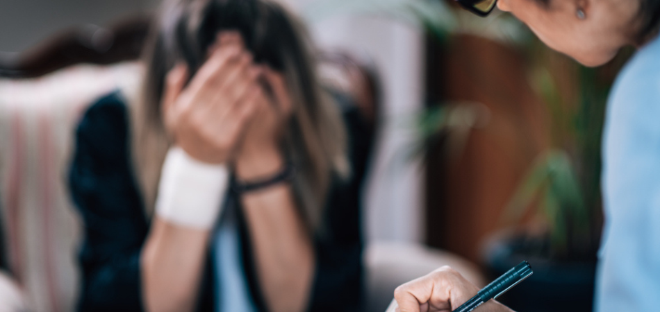 A woman in one to one counselling as part of oxycodone rehab