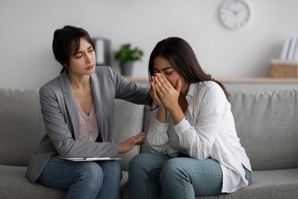 Woman consulting with doctor