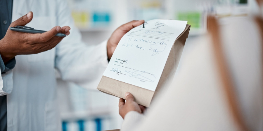 Prescription in doctors hand