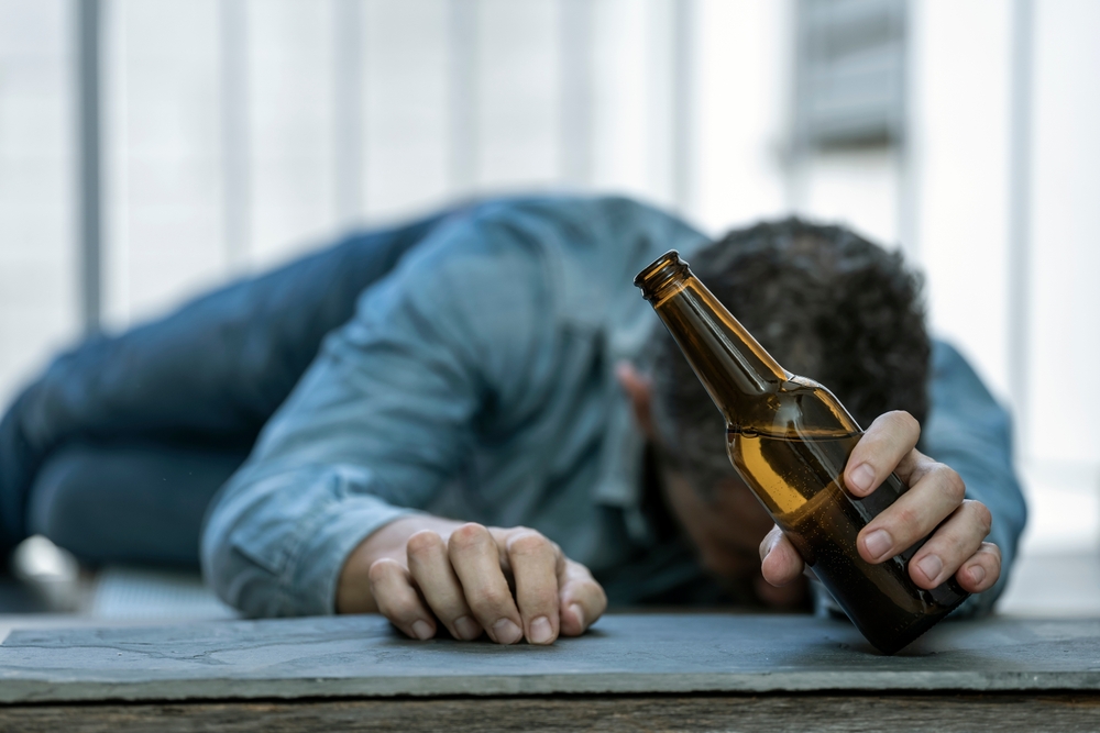 alcoholic-man-with-bottle