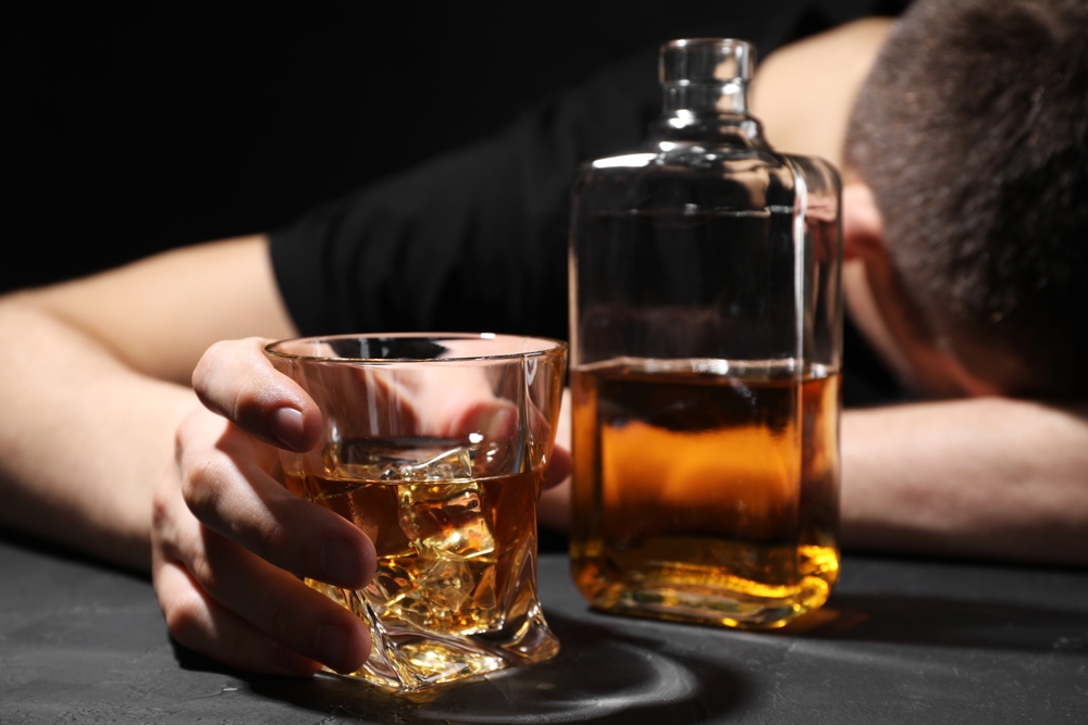 bottle-of-alcohol-with-glass