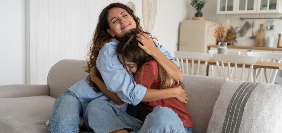 mother supporting her daughter after rehab