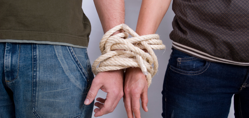 Co-dependency couple tied together