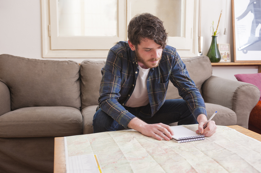 man-writing-in-paper