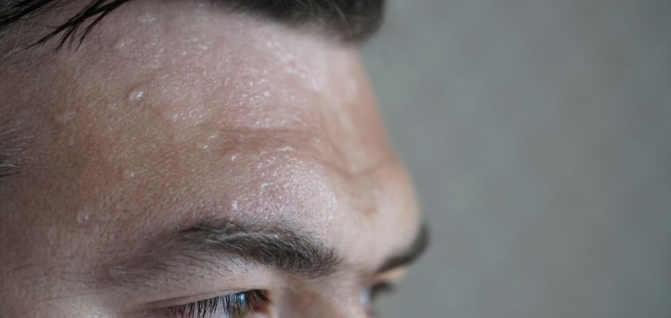 Forhead sweating on addicted man