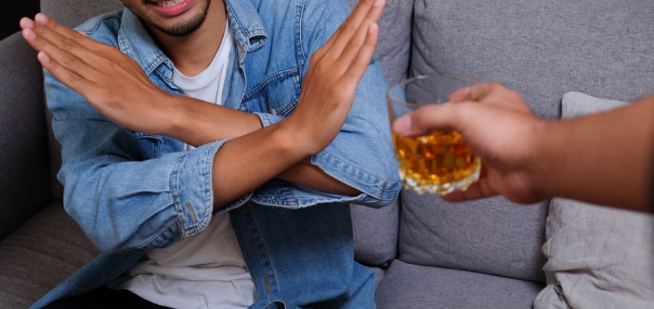 asian man refuse drinking
