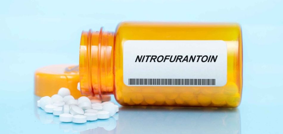 Nitrofurantoin tablets in bottle