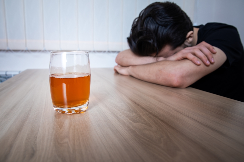 young-man-struggling-with-alcohol-addiction