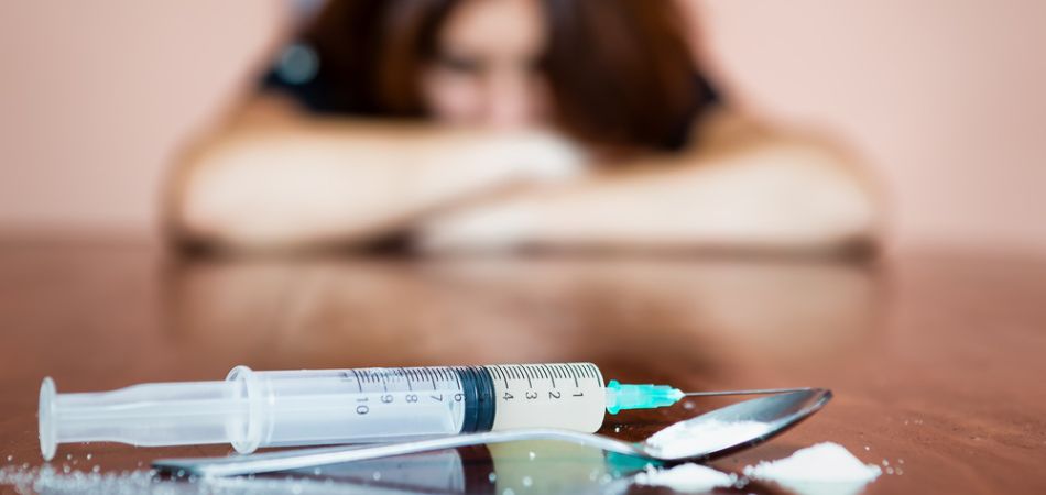 injection-and-drugs-on-table