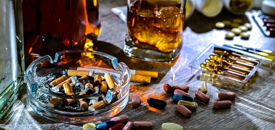 tablet with alcohol and pills