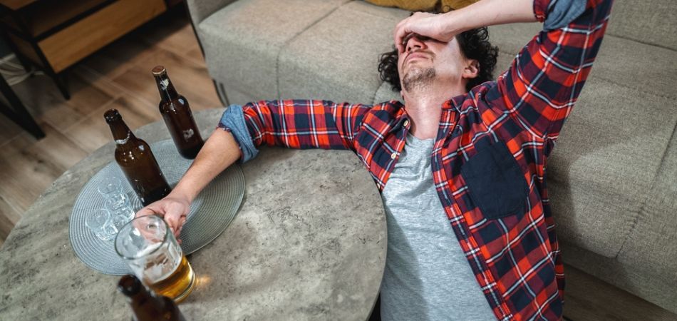 man in alcohol hangover