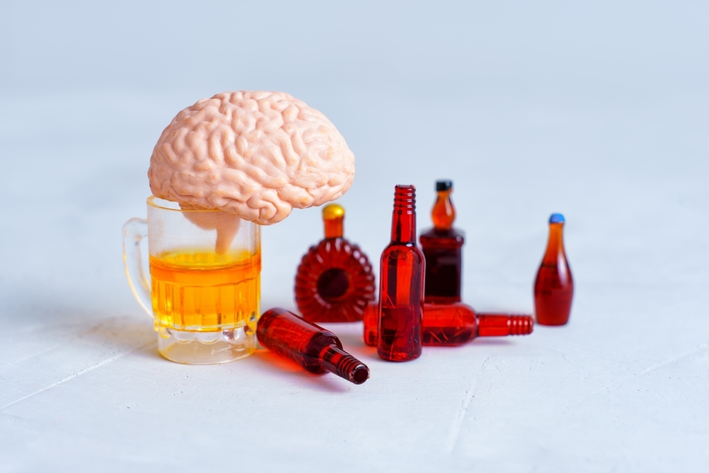 Brain and alcohol bottle