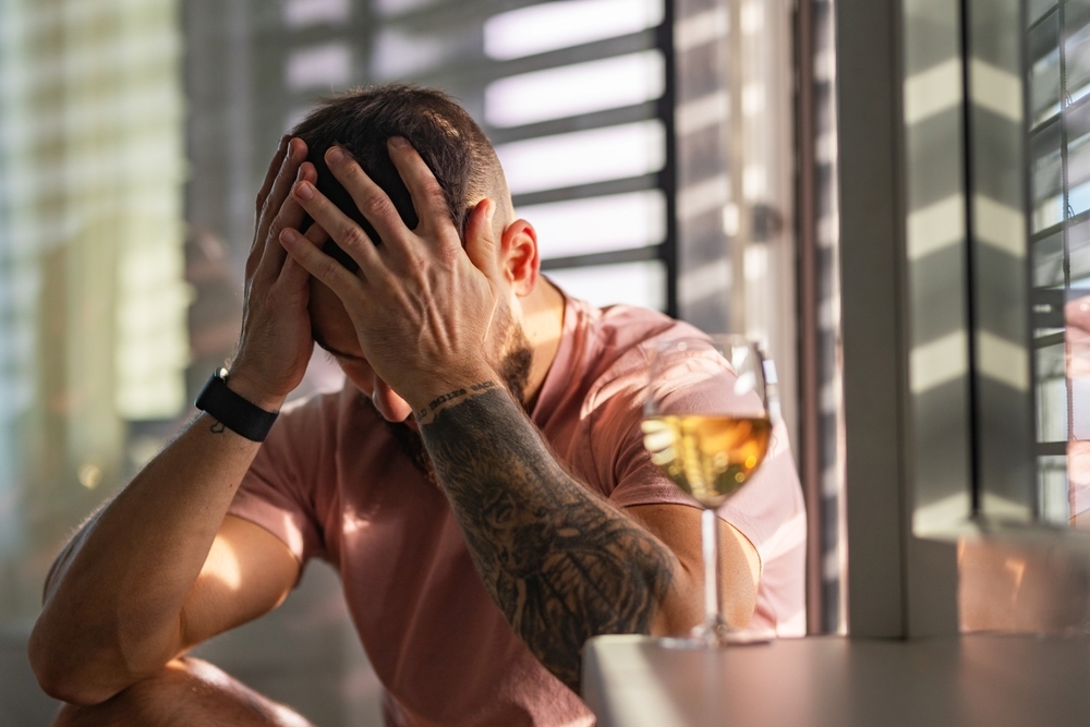 Man in depression after drinking alcohol