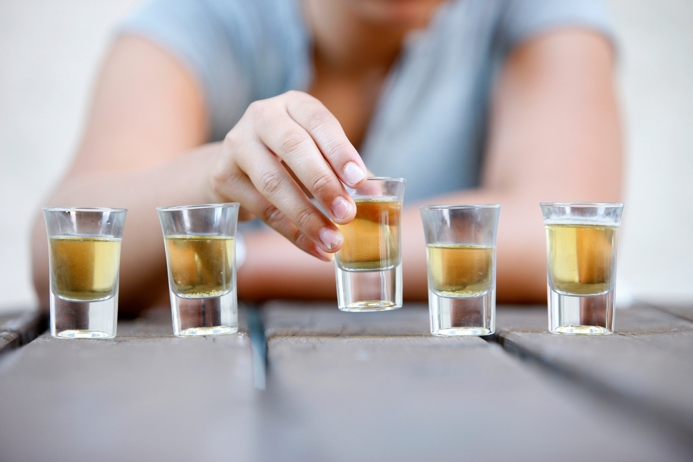 woman-with-alcohol-shorts