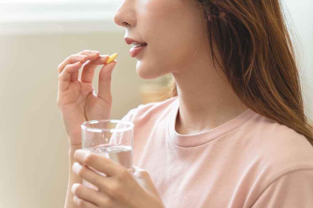 young-girl-taking-medicine