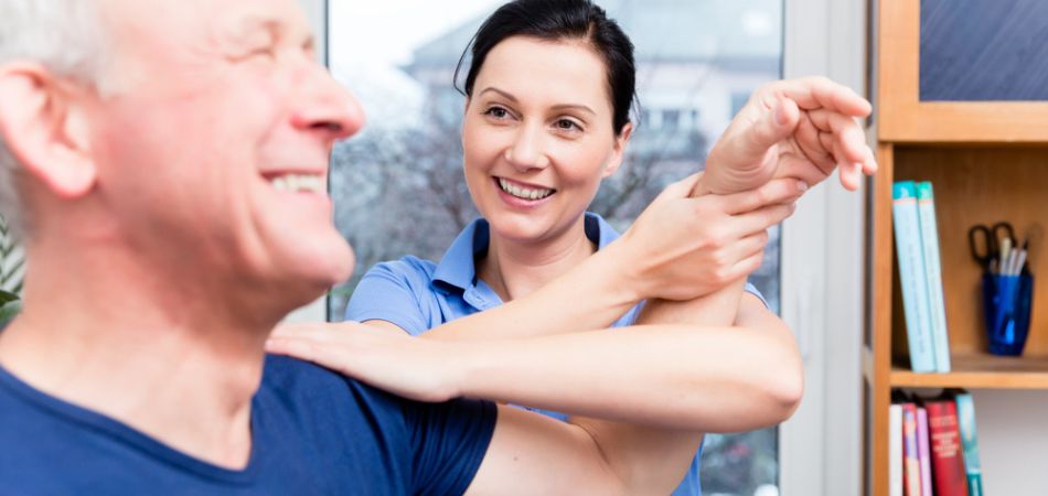 old man doing excersice in rehab