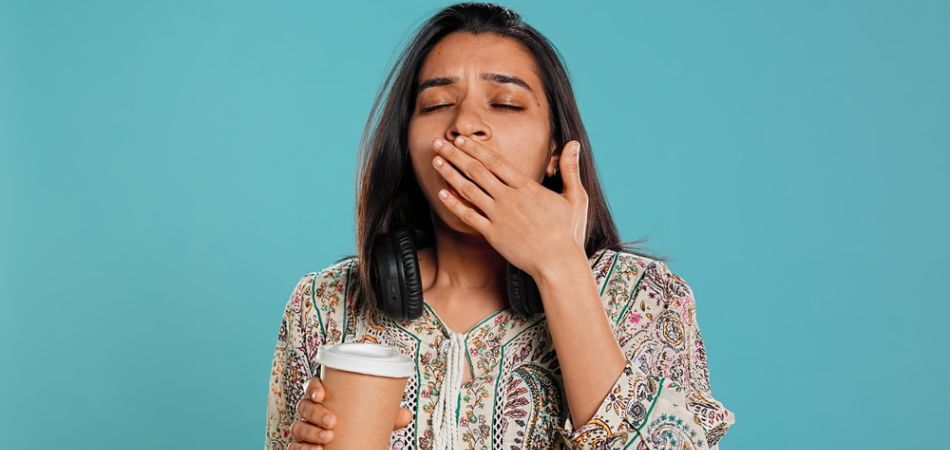 young lady feeling sleepyness