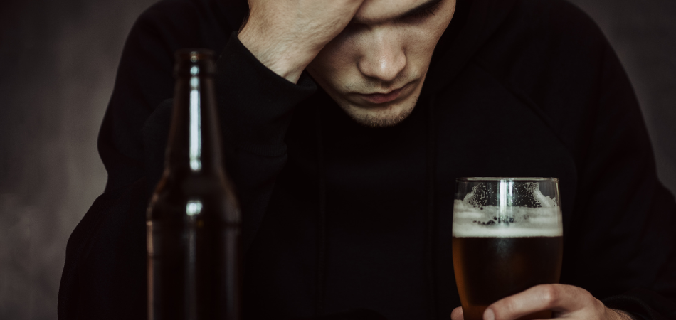 Tramadol and alcohol unhappy man with beer