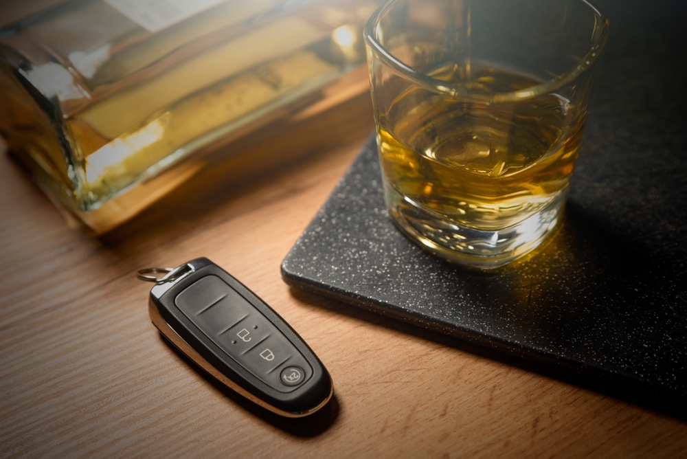 Drink and drive alcoholism with car keys