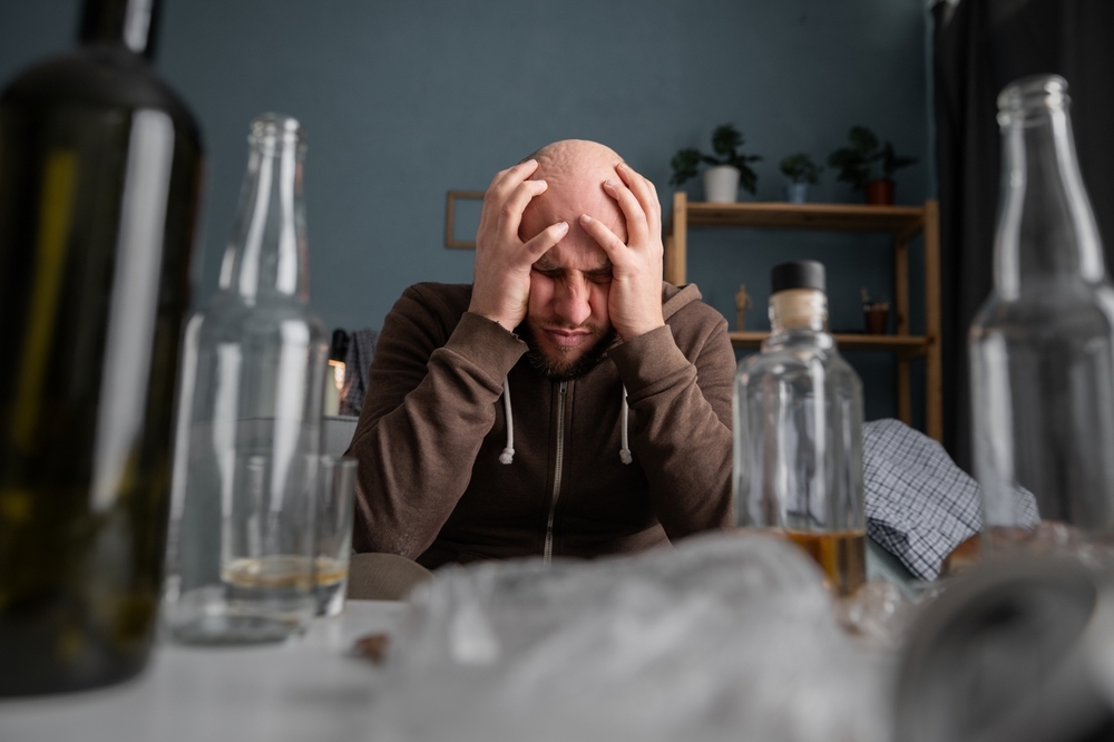 Young man in depression and addiction