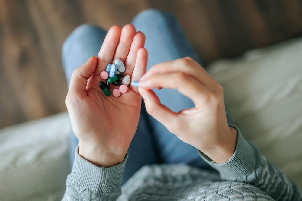 man-taking-Lorazepam-tablets