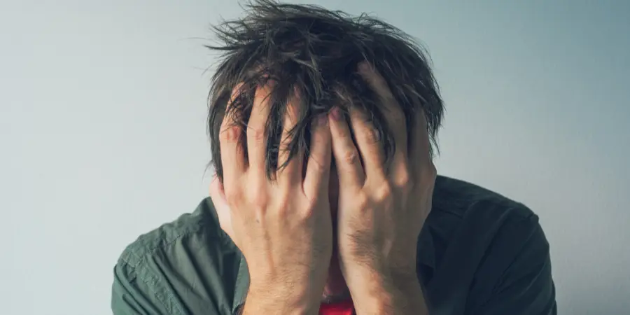 A man scared due to his schizophrenia