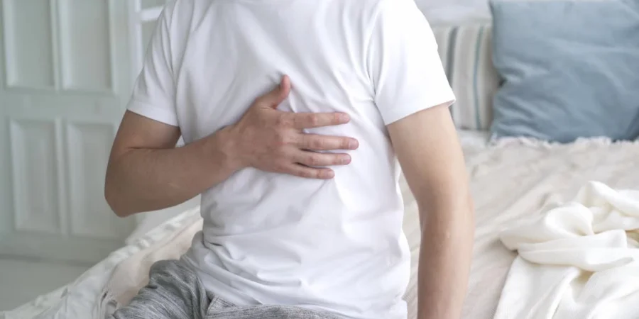 Person experiencing heart pain as a result of their Focalin addiction