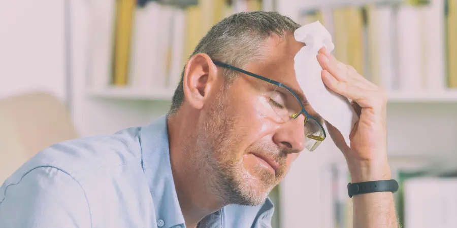 Man sweating as a side effect of his prescription drug detox