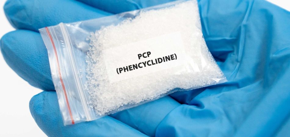 Phencyclidine addiction dust on hand