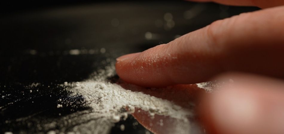 man with Codeine tablet dust