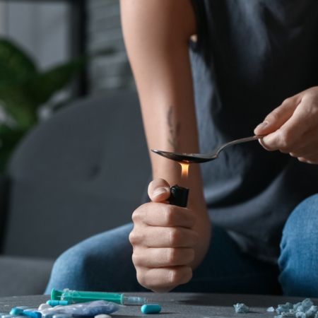 woman taking Crack Cocaine