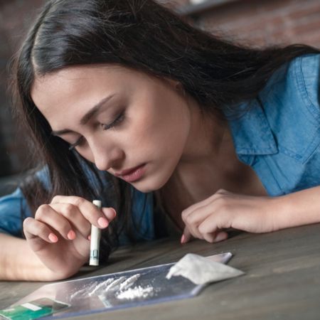woman taking cocaine