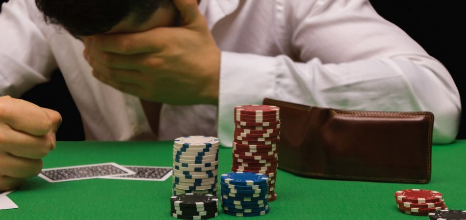 man suffring gambling addiction