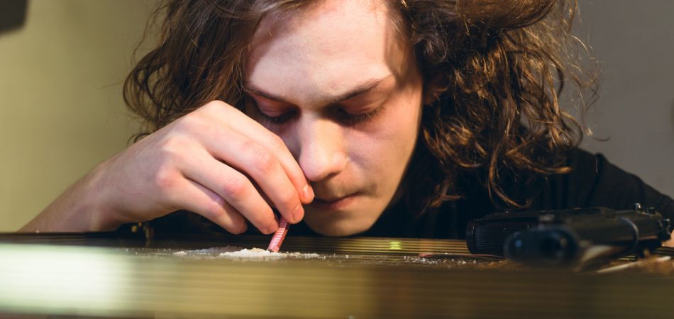 young boy Snorting Cocaine