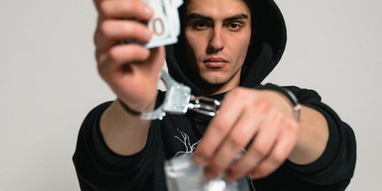 young man on drugs on hand