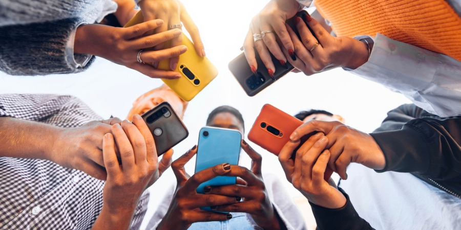 group of people using phone