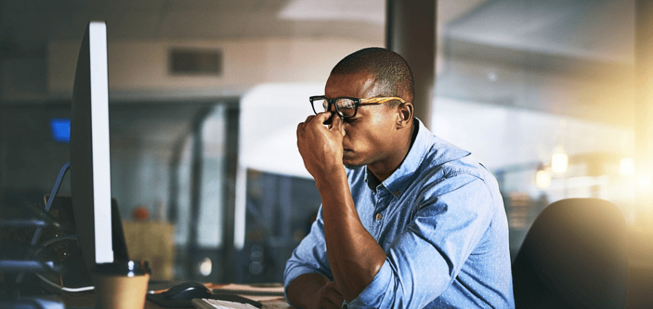 Man in stress at working place