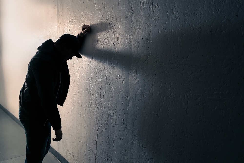 Alone man in stress after drinking alcohol