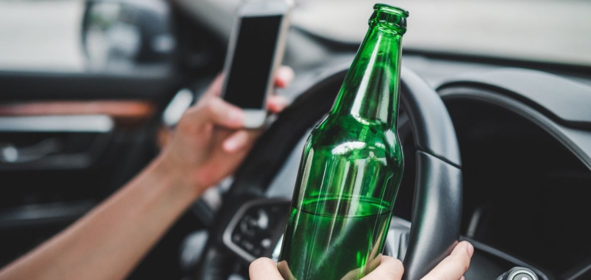 Man drinking and driving