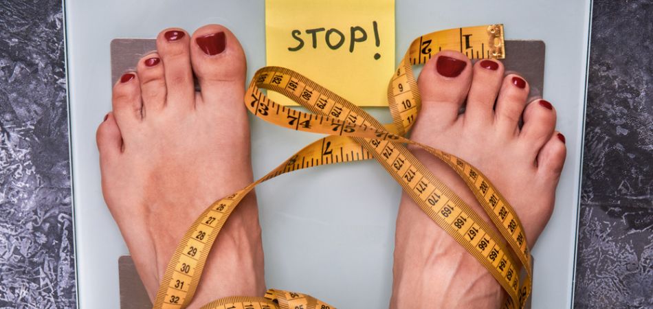 woman checking her weight